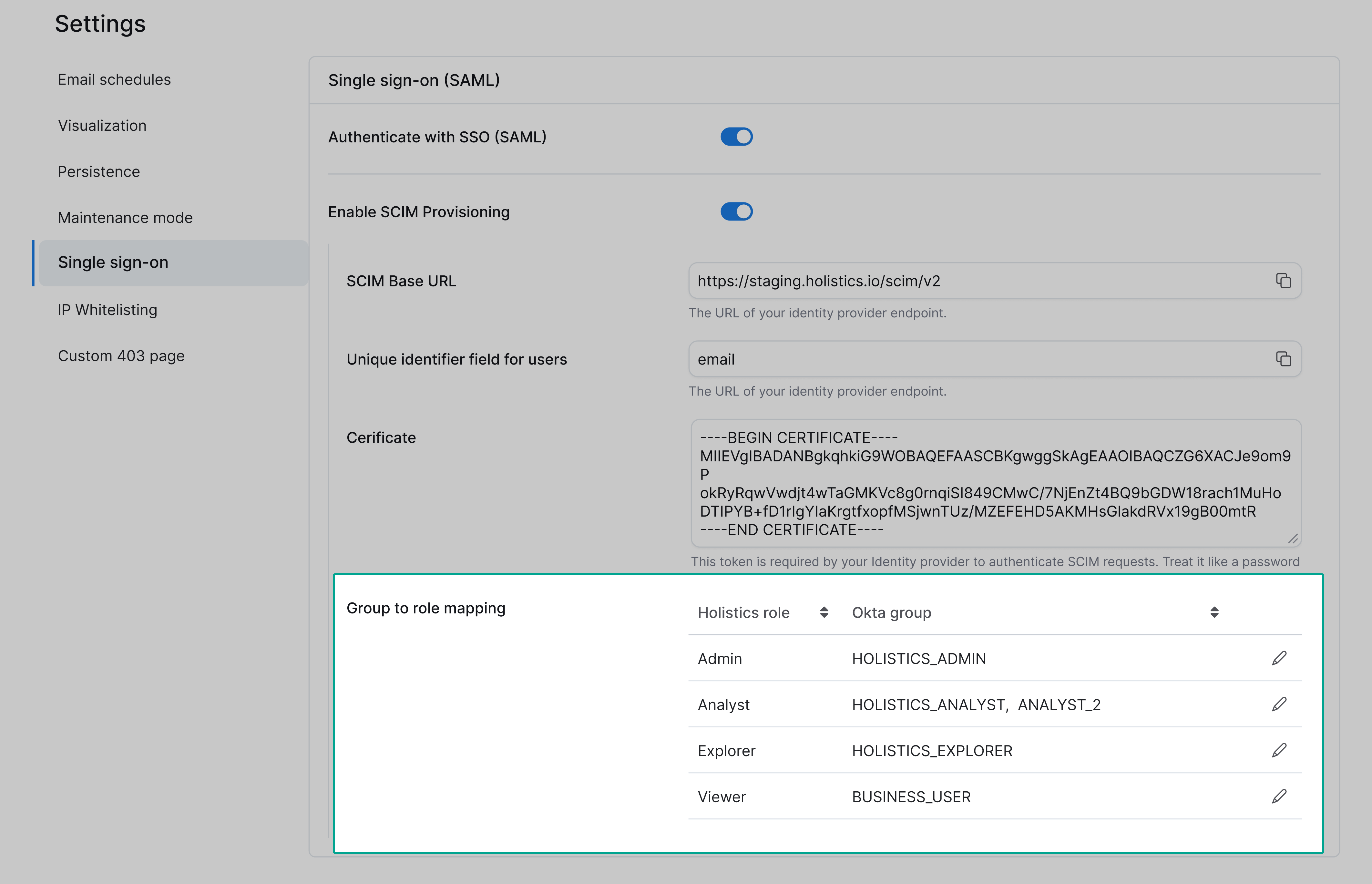 Group-to-role mapping configuration in Holistics, showing IdP groups being mapped to Holistics roles like Admin, Analyst, and Explorer.